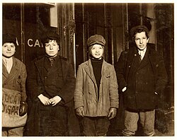 Newsboys for one of the precursors of The Observer-Dispatch in 1910, photographed by Lewis Hine