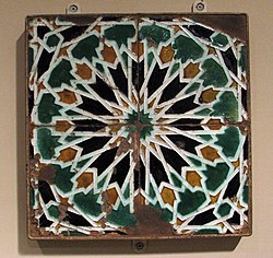 Example of cuenca or arista tiles with Islamic geometric motifs, produced in 16th-century Spain, at the Metropolitan Museum of Art[26]