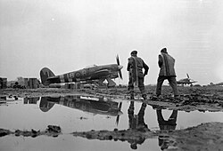 Two armourers of No. 440 Squadron RCAF, re-arming a Hawker Typhoon. By the end of the Second World War, Canada possessed the fourth-largest air force in the world.