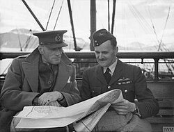 Lieutenant General Claude Auchinleck, the C-in-C of the North Western Expeditionary Force, and Group Captain Moor looking over maps on board the Polish Navy troopship MS Chrobry before docking in Harstad.