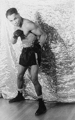 Henry Armstrong, known for his aggressive, non-stop assault style of fighting