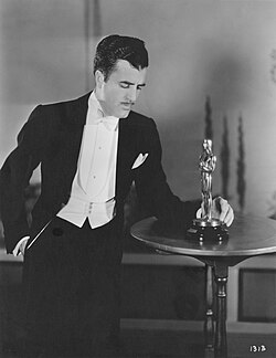 Cedric Gibbons (pictured at the 2nd Academy Awards in April 1930) was the original designer of the Oscar statuette.