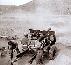 New Zealand artillery crew in action, 1952