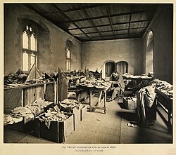 Solomon Schechter at work in Cambridge University Library, studying the fragments of the Cairo Geniza, c. 1898