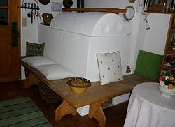 A stove bench in the living room of a German farmhouse
