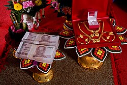 A traditional, formal presentation of the bride price at a Thai engagement ceremony.