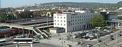 Station from the southeast, old station footbridge and InterCityHotel