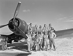 VMF-113 pilots pose for a photo on Engebi Island, 1944.