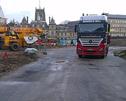 Building work began again in January 2014, beginning by demolishing the temporary urban park which had occupied part of the site since 2010.