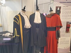 Judicial robes for Judge of High Court in Malaysia. The red robe (right) is former robe for criminal cases until 1980s. Daily robe in court (middle) and ceremonial robe (left) is current robe.