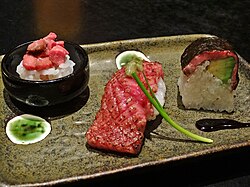 Sushi made of meats other than fish (whether raw or cooked) is a variation often seen in Japan.