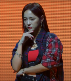 Kim promoting with Gugudan in 2018. This was the group's last comeback before their hiatus and eventual disbandment in December 2020.