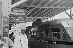 Sign for the "colored" waiting room at a bus station in Durham, North Carolina, May 1940