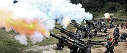 105mm howitzers of the 6th Infantry Division's Artillery Brigade