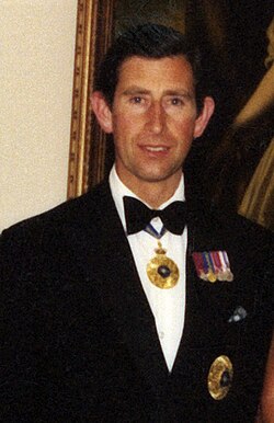 King Charles III (then Prince of Wales) wearing the insignia of a Knight of the Order of Australia, 1983