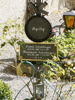Schrödinger's equation inscribed on the gravestone of Annemarie and Erwin Schrödinger. (Newton's dot notation for the time derivative is used.)