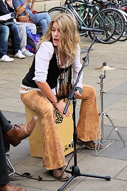 Heidi Joubert playing a decorated cajón in Cambridge, England