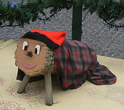 A tió exhibited at Plaça Sant Jaume in Barcelona in the 2010–2011 Christmas season