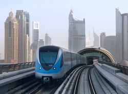 A Dubai Metro train. Dubai Metro is the Arabian peninsula's first rapid transit system and was the world's longest driverless metro network until 2016.