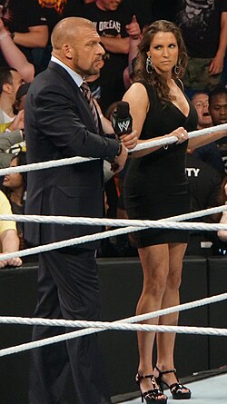 Former WWE Chairwoman and CEO Stephanie McMahon (right) with her husband WWE CCO and Head of Creative Triple H (left)