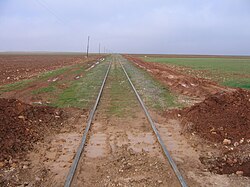 Railway passes varied landscapes: the plains north of Aleppo, Syria