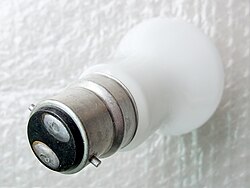 The double-contact bayonet cap on an incandescent bulb