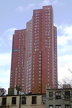 Confucius Plaza, a 44-story subsidized housing cooperative, above typical Chinatown housing stock.