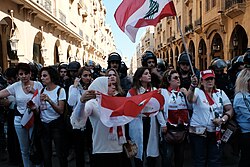 Women protesters forming a line between riot police and protesters in Riad el Solh, Beirut; 19 November 2019