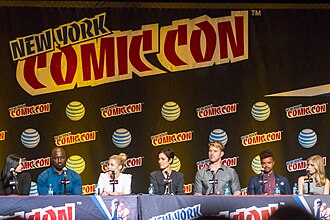 Cast of Jessica Jones at the 2015 New York Comic Con. (L to R: Ritter, Colter, Taylor, Moss, Traval, Darville, Moriarty)