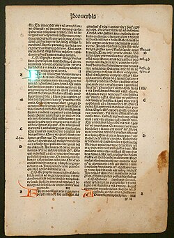 Page of a rare blackletter Bible, 1497, printed in Strasbourg by Johann Grüninger, then one of the city's most prolific printers. The red chapter initials were handwritten by a rubricator after printing.