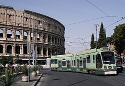 Tram line 3 Socimi in front of Colosseum in Rome.