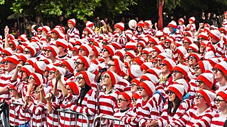 Attendees at the 2011 Where's Wally? Guinness World Record event in Dublin, Ireland. Setting a record for 3,872 people dressed as Wally, the total was surpassed in 2017 with 4,626 people in Japan.[20]