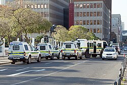 SAPS vehicles outside the main entrance to Parliament, in the center of Cape Town CBD