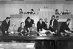 The signing of the Geneva Conventions in 1949. A country's signature, through plenipotentiaries with "full power" to conclude a treaty, is often sufficient to manifest an intention to be bound by the treaty.