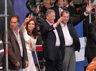 President Néstor Kirchner (2nd from right) backs winning Front for Victory candidates (from L to R) Daniel Scioli (Governor), Cristina Fernández de Kirchner (President) and Julio Cobos (Vice President).