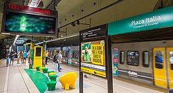 A "digital space" at Plaza Italia station, which also features the new matte signs.