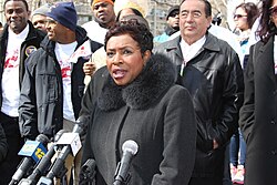 Clarke speaking at an anti-violence march in Brooklyn