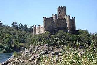 Almourol Castle in Portugal, which stands on a small islet in the Tejo River.