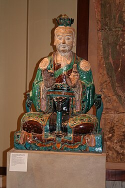 Glazed stoneware statue of a Taoist deity, 16th century