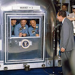 Nixon visits the Apollo 11 astronauts in quarantine aboard the USS Hornet in July 1969