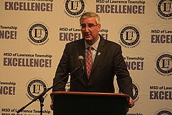 Holcomb at a gubernatorial debate
