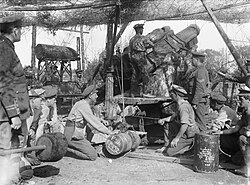 The "triumph of the murderous machine":[9] a British 12-inch howitzer with its 750 lb (340 kg) shell at Thiepval, September 1916