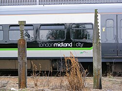 Wooden ties recycled as sculptures at Northfield railway station