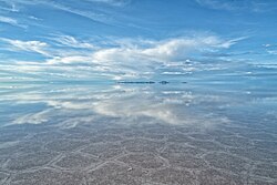 Natural reflections in the Salar de Uyuni during the rainy season