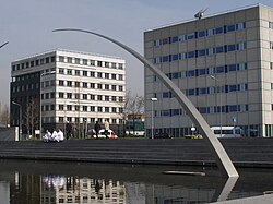 Monument for Peter Debye in the Maastricht square that bears his name: Dipole moments (Felix van de Beek, 1998)