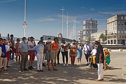 Diallo leading a guided tour in Le Havre in 2020