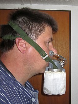 Self-rescue respirator, as worn during use