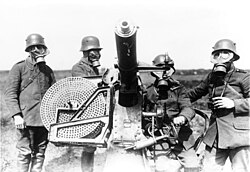 German gunners wearing gasmasks, with Maxim Flak M14