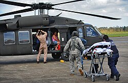 Louisiana National Guardsmen evacuating citizens from Port Sulphur