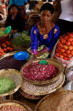 Women selling produce at a market in Lilongwe, Malawi